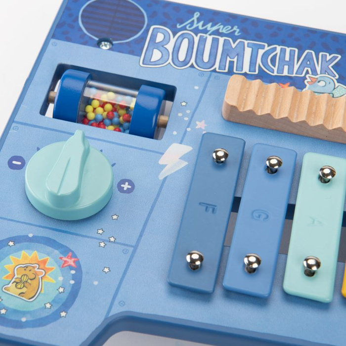 Drewniany stolik muzyczny wielofunkcyjny Puce & Pilou Moulin Roty 684092 zestaw instrumentów dla dzieci