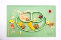 EZPZ Silikonowy talerzyk z podkładką 2w1 Happy Mat pastelowa zieleń EUHMS001- EZPZ, naczynia dla dzieci