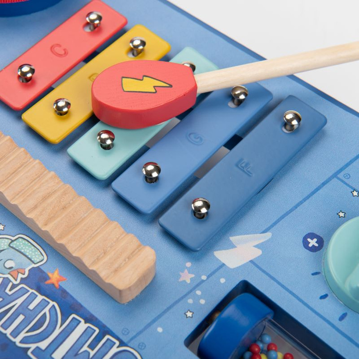 Drewniany stolik muzyczny wielofunkcyjny Puce & Pilou Moulin Roty 684092 zestaw instrumentów dla dzieci