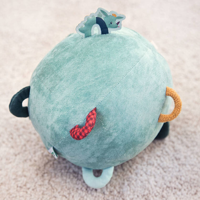 Piłka sensoryczna z pozytywką wielofunkcyjna miękka pluszowa Smok Joe 83397 Lilliputiens