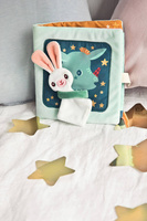 Miękka książeczka aktywizująca z mini komforterem Smok Joe i jego przytulanka 83492 LILLIPUTIENS