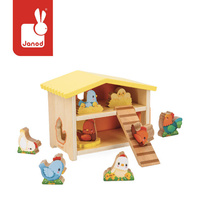 Drewniany domek z sorterem Farma Mój pierwszy kurnik J03311 Janod