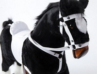 Czarny koń dla dzieci z jasnym siodłem, koń na biegunach