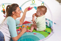 Mata edukacyjna z pałąkami i zabawkami interaktywnymi dla niemowląt Zabawa na łące Tiny Love TL1205006830