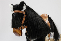 Łaciaty koń na biegunach Miłka, zabawka dla trzylatka