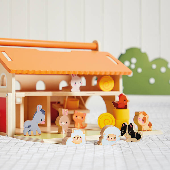 Drewniana farma z otwieranym dachem i figurkami Janod J03318 zabawki edukacyjne