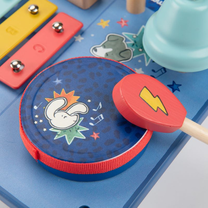 Drewniany stolik muzyczny wielofunkcyjny Puce & Pilou Moulin Roty 684092 zestaw instrumentów dla dzieci