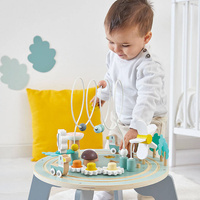 Wielofunkcyjny stolik edukacyjny drewniany z regulacją wysokości Ogród Sweet Cocoon Janod J04045