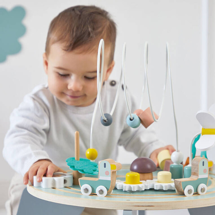 Wielofunkcyjny stolik edukacyjny drewniany z regulacją wysokości Ogród Sweet Cocoon Janod J04045