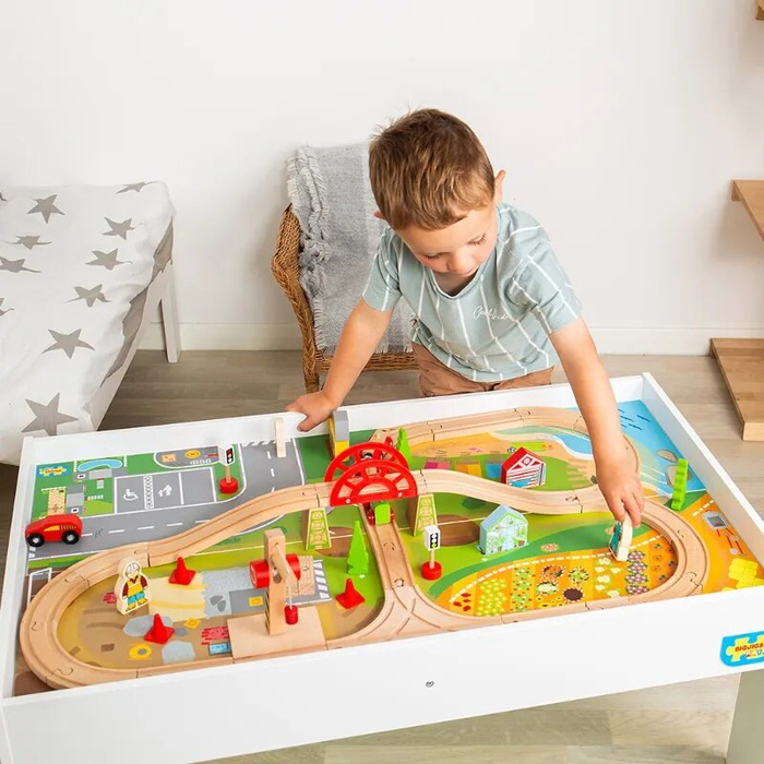 Drewniana kolejka dla dzieci w zestawie na drewnianym stole Bigjigs Rail BJT550 