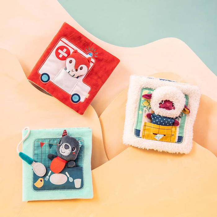 Książeczka aktywizująca z miniprzytulanką Smacznego! Wilk Louis Lilliputiens 83535