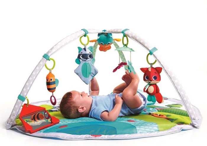 Mata edukacyjna z pałąkami i zabawkami interaktywnymi dla niemowląt Zabawa na łące Tiny Love TL1205006830