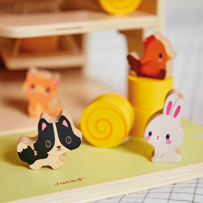 Drewniana farma z otwieranym dachem i figurkami Janod J03318 zabawki edukacyjne