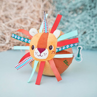 Piłeczka sensoryczna z dzwoneczkiem i wypustkami Lew Jack 83476 LILLIPUTIENS 