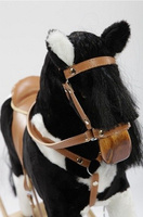 Łaciaty koń na biegunach Miłka, zabawka dla trzylatka